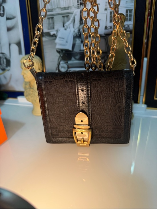 Gucci Handbags - Authentic Gucci Black Signature wallet with Gold Snap. Free COA,insert,chain.